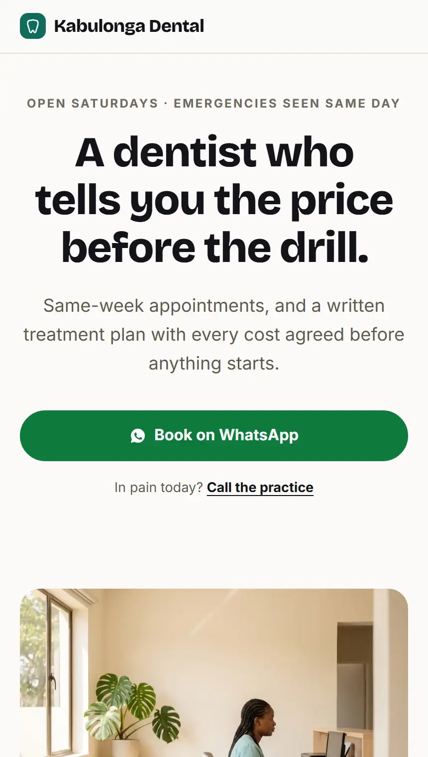 The Kabulonga Dental website on a phone.